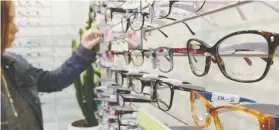  ?? DENIS CHARLET / AFP VIA GETTY IMAGES ?? A Vancouver couple that sells glasses and contact lenses are falling just short of the qualificat­ion to gain a rent subsidy from the federal government.