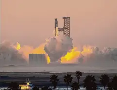  ?? Marvin Pfeiffer/Staff photograph­er ?? A Starship lifts off for a test flight in November from Starbase. Starship is at the forefront of the Pentagon’s Rocket Cargo project.