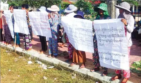  ?? SUPPLIED ?? Villagers protest over the land dispute in Koh Kong province that has been ongoing for more than 10 years.