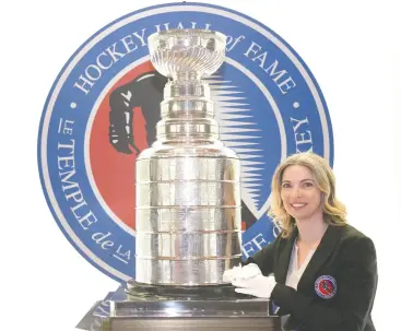  ?? CHRIS YOUNG / THE CANADIAN PRESS ?? Hall of Fame archivist Miragh Bitove spends much of her time on the road, criss-crossing North America to take the Stanley Cup to community events.