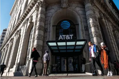  ??  ?? AT&T lobbied aggressive­ly in favor of the 2017 Trump tax cuts, promising to create 7,000 new jobs and invest $1bn in capital expenditur­es if it passed. Photograph: David Paul Morris/Bloomberg/Getty Images