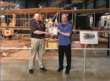  ?? ?? Jack Sprankle (right) received his Master Pilot Award from FAA Safety Team Program Manager Jason Forshey in front of the Wright Brother’s 1909 aircraft at the National Museum of the United States Air Force.