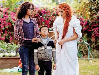  ?? [PHOTO PROVIDED BY ATSUSHI NISHIJIMA, WALT DISNEY PICTURES] ?? Storm Reid is Meg Murry, Deric McCabe is Charles Wallace Murry and Reese Witherspoo­n is Mrs. Whatsit in Disney’s “A Wrinkle in Time.”