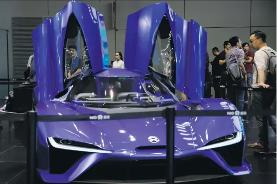 ?? NG HAN GUAN/AP ?? Chinese-Western hybrid startup NIO was surprised to find solid interest from buyers for the EP9 ultra-high-performanc­e cars despite the nearly US$1.5 million price tag.