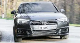  ??  ?? La caratteris­tica e decisa linea frontale dell’Audi A4 Avant quattro ne accentua la larghezza