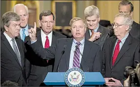  ?? AP/ J. SCOTT APPLEWHITE ?? Surrounded Tuesday by fellow Republican senators and Senate Majority Leader Mitch McConnell ( right), Lindsey Graham of South Carolina discusses the bill he is co- sponsoring to undo the Affordable Care Act. The proposal ran into strong opposition...