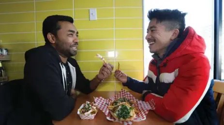  ??  ?? Food writers Suresh Doss, left, and Karon Liu spent an afternoon tasting the different ways shawarma is prepared along Lawrence Ave. E.