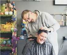  ??  ?? Gary shaving Mags’ head.