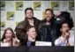  ?? THE ASSOCIATED PRESS ?? Holland Roden, from seated left, Jeff Davis and Tyler Posey announce castmates Ian Bohen, from standing left, and J.R. Bourne at the “Teen Wolf” panel on day 1 of Comic-Con Internatio­nal on Thursday in San Diego.