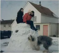  ??  ?? Girls and dog with their snow castle c.1966