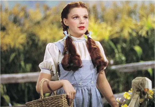  ?? — WARNER BROS. FILES ?? The Wizard of Oz, starring Judy Garland, has been referenced nearly 3,000 times in other movies and TV shows, according to University of Turin researcher­s.