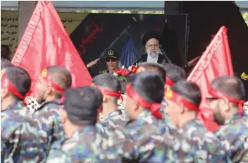  ?? ?? IRANIAN PRESIDENT Ebrahim Raisi looks at the armed forces members during the National Army Day parade ceremony in Tehran, on April 17. (Majid Asgaripour/WANA/Reuters)