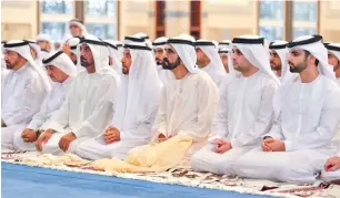  ??  ?? Sheikh Mohammed bin Rashid offer the Eid Al Fitr prayers on Friday morning at Zaabeel Mosque, along with sheikhs, officials and other worshipper­s.