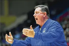  ??  ?? McEachern boys coach Mike Thompson, whose 2019 team went 32-0 and won the Class AAAAAAA title, would be in favor of a “Hoosiers”-like all-classifica­tion tournament.