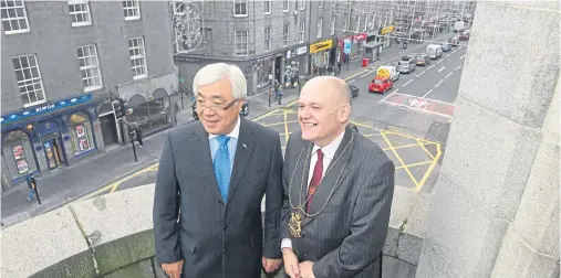  ??  ?? MEETING: Kazakhstan’s ambassador Erlan Idrissov with Lord Provost Barney Crockett at the town house in Aberdeen