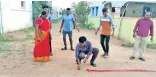  ??  ?? Family members and villagers celebrate Mariyappan Thangavelu winning silver medal by bursting crackers in Salem on Tuesday