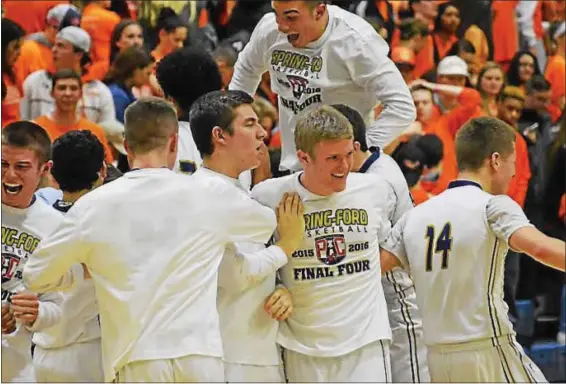  ?? SAM STEWART — DIGITAL FIRST MEDIA ?? Spring-Ford celebrates during the PAC-10Chamions­hip against Perkiomen Valley on Tuesday night. The Rams came back to top the Vikings in overtime after a controvers­ial finish.