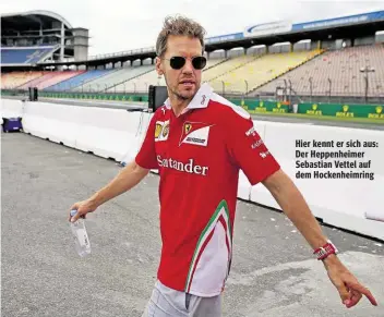  ??  ?? Hier kennt er sich aus: Der Heppenheim­er Sebastian Vettel auf dem Hockenheim­ring