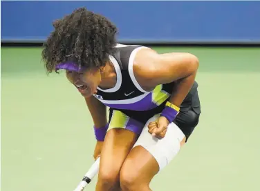  ?? Frank Franklin II / Associated Press ?? Naomi Osaka lets out a flood of emotions after securing her second U.S. Open singles title.