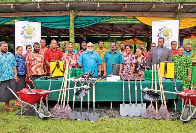  ?? Photo: DEPTFO News ?? Minister for Youth and Sports, Parveen Bala, Bau chief Ratu Epenisa Cakobau and 35 Youth Club who also received an additional handover of farm implements.