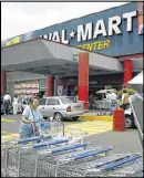  ?? SARAH MARTONE / BLOOMBERG NEWS ?? The retail behemoth has 211 Walmart and Sam’s Club retail outlets in the state.