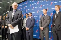  ?? CP PHOTO ?? NHLPA Executive Director Donald Fehr, left, addresses journalist­s as he stands in front of players, including Sidney Crosby, centre, following collective bargaining talks in Toronto on October 18, 2012.