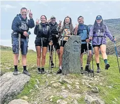  ?? ?? Poignant Tackling Mount Snowdon were Matthieu, Hannah, Hervé, Roxanne, Ross and Mhairi