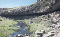  ?? GOTZ OSSENDORF THE NEW YORK TIMES ?? Humans may have settled in places at high altitude such as the Fincha Habera rock shelter in the Bale Mountains of Ethiopia, far earlier than once believed.