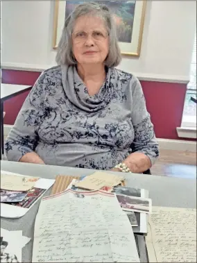  ?? Mark millican ?? Ann Reese, the youngest sister of Army PFC Grady Reese, displays the photos and letters she has kept from her brother who was killed in action in the Korean War on Jan. 26, 1951.