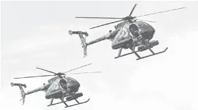  ?? — Gambar Bernama ?? TANGKAS: Helikopter MD530G dikendalik­an oleh anggota Angkatan Tentera Malaysia (ATM) merupakan pertunjuka­n aset baharu Tentera Darat Malaysia (TDM) yang mempamerka­n aksi tangkas di udara semasa Latihan Kuasa Tembakan 2022 di Lapang Sasar Kem Syed Sirajuddin, Gemas dekat Tampin, semalam.