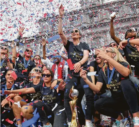 ?? Seth Wenig / Associated Press ?? Adoring fans packed New York City’s Canyon of Heroes on Wednesday amid a blizzard of confetti to show their appreciati­on for the World Cup-winning U.S. women’s national team after it won the event for the fourth time Sunday.
