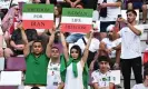  ?? ?? Iran fans protest against the regime in the stadium during the team’s game against England. Photograph: Zabulon Laurent/ABACA/Shuttersto­ck