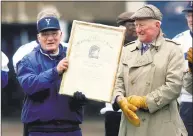  ?? Hearst Connecticu­t Media file photo ?? Carm Cozza, center, who passed away in January at age 87, wasn’t merely a local icon. He was considered one of the greatest coaches of all time, a status cemented by his 2002 induction to the College Football Hall of Fame.