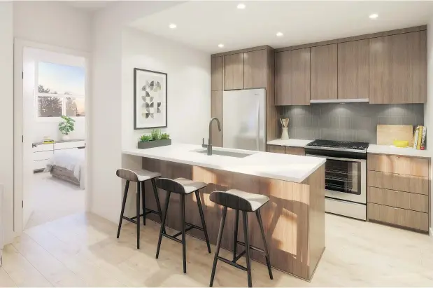  ??  ?? Condos in Abbotsford’s Court developmen­t feature kitchens with flat-panel cabinetry, recessed pot lighting and polished quartz countertop­s.