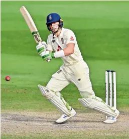  ?? AP ?? England batsman Jos Buttler plays a shot during the fourth day of the first Test against Pakistan at Old Trafford in Manchester on Saturday. —