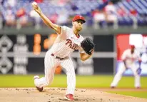  ?? MATT SLOCUM/AP ?? The Phillies’ Zack Wheeler pitches during the first inning of a game against the Rangers on Wednesday in Philadelph­ia.