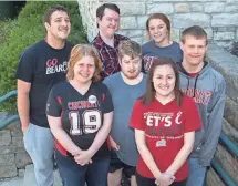  ?? JOSEPH FUQUA II, UNIVERSITY OF CINCINNATI ?? Students pose for a photo last week by their dorm: clockwise from top left, students Stephen Krawee and Benjamin Minney, student teacher Erin Vogt, and students Peter Merz, Arielle Bachrach, Brett Eisentrout and Karly Saeks.