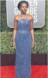  ??  ?? Swinging beaded blue fringe? We bow down to Black Panther queen Lupita Nyong’o.