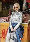  ?? CONTRIBUTE­D BY ROY ZHANG ?? Lyn Slater’s Instagram account — largely comprising photos of herself in striking couture — has more than 200,000 followers, with some photos garnering more than 50,000 likes.