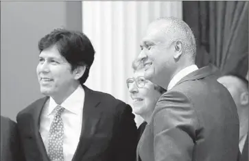  ?? Rich Pedroncell­i Associated Press ?? SENATE LEADER Kevin de León, left, with Sens. Lois Wolk and Ed Hernandez at the Capitol on Friday. De León praised the legislatio­n as “the most expansive tobacco control legislativ­e package in over a decade.”