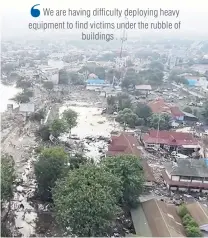  ??  ?? Swept away . . . Rubble is strewn about after an earthquake and tsunami ravaged Palu, Sulawesi, on Saturday.