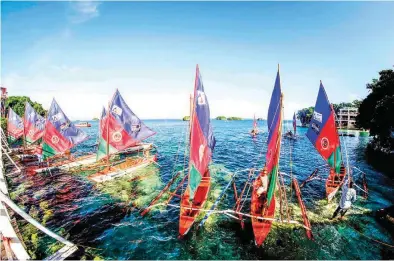  ??  ?? PARAW PARADE — The colorful ‘paraw’ are ready to set sail for the morning ride schedule at the Lucap Wharf in Alaminos City. These fishing vessels, which offer island-hopping or even fishing trips at the Hundred Islands National Park, are credited for increasing tourist arrivals by 20 percent. (Jojo Riñoza)