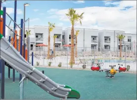  ?? Bizuayehu Tesfaye Las Vegas Review-journal @bizutesfay­e ?? The Showboat Park Apartments complex, which sits on the site of the former Showboat hotel near downtown Las Vegas, features a playground among its amenities.