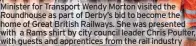  ?? ?? Minister for Transport Wendy Morton visited the Roundhouse as part of Derby’s bid to become the home of Great British Railways. She was presented with a Rams shirt by city council leader Chris Poulter, with guests and apprentice­s from the rail industry