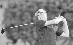  ??  ?? PGA golfer Jordan Spieth tees off on the first hole during the final round of the Tournament of Champions golf tournament at Kapalua Resort - The Plantation Course. — USA TODAY Sports photo