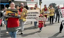  ?? ANDY MACDONALD/STUFF ?? Taranaki Firefighte­rs took part in a strike yesterday, demanding better conditions from Fire and Emergency New Zealand.