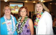  ?? NWA Democrat-Gazette/CARIN SCHOPPMEYE­R ?? Lynne Keller (from left), Cindy Acree, ERC executive director, and Amber Candur gather at the Beach Bingo Bash.