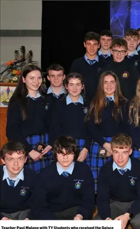  ??  ?? Teacher Paul Malone with TY Students who received the Gaisce award at the Bush Post Primary Annual School Awards for 2018.