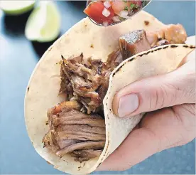  ?? CARL TREMBLAY THE ASSOCIATED PRESS ?? Bay leaves and oregano provide aromatic notes to these authentic carnitas, and cumin brings an earthiness that complement­s the other flavours.