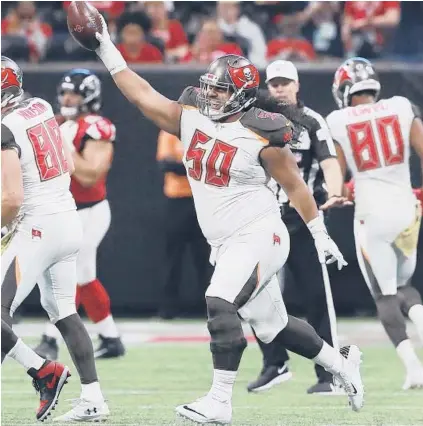  ?? CURTIS COMPTON/AP ?? Buccaneers defensive lineman Vita Vea celebrates his touchdown catch against the Falcons on Nov. 24, 2019, in Atlanta.